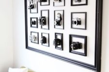11 a frame with frames inside and cameras in each of the frames is a bold artful display