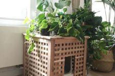 12 IKEA Hol hack to hide a small litter box and a plant stand in one