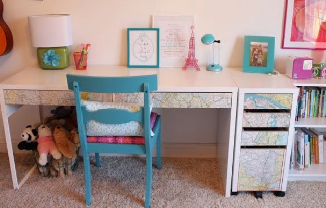 decoupaged IKEA Micke desk with a world map for a kids' room
