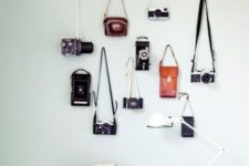 13 attach some hooks and hang your vintage cameras on the wall creating a display