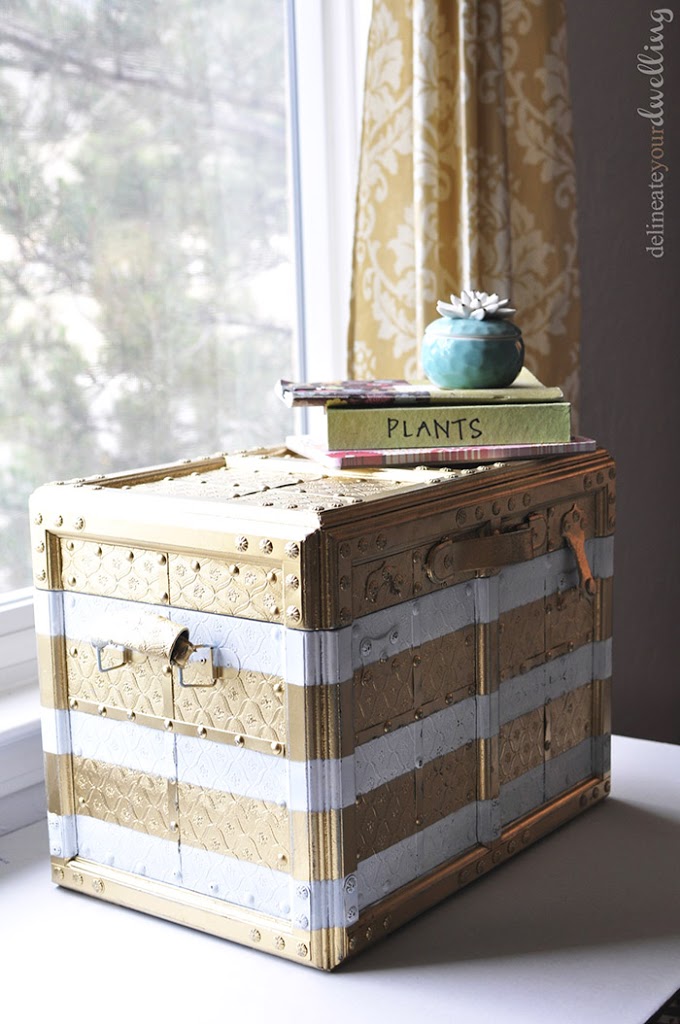 DIY striped gold and white trunk makeover (via www.delineateyourdwelling.com)