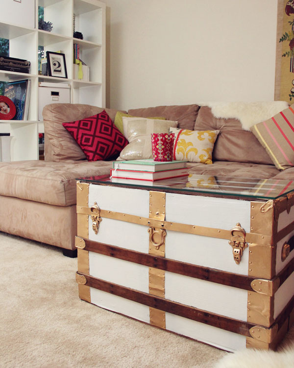 DIY vintage trunk turned into a coffee table with a glass top (via lovelyindeed.com)