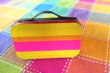 DIY mint tin lunch box spruced up with colorful duct tape