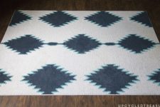 DIY painted rug with a mid-century pattern inspired by West Elm