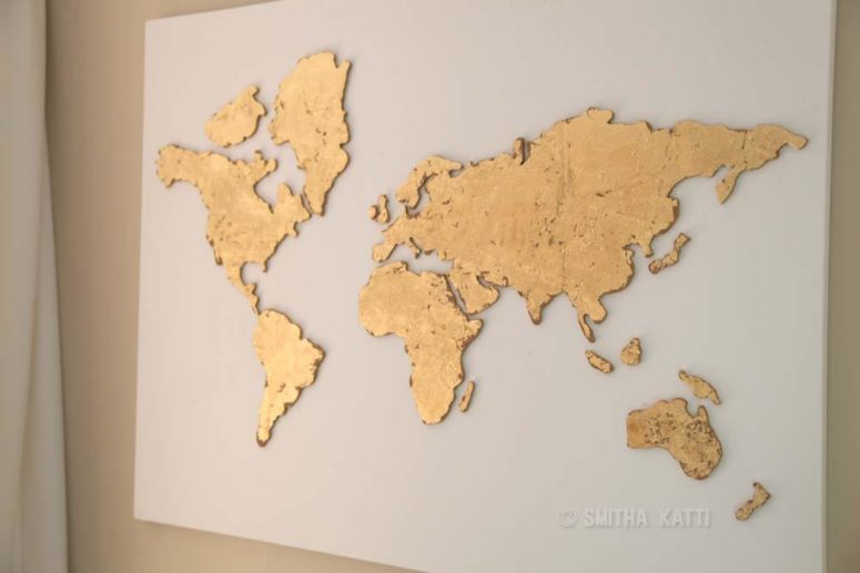 DIY shiny gold leaf cork world map (via www.smilingcolors.com)