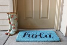 DIY blue HOLA doormat with calligraphy