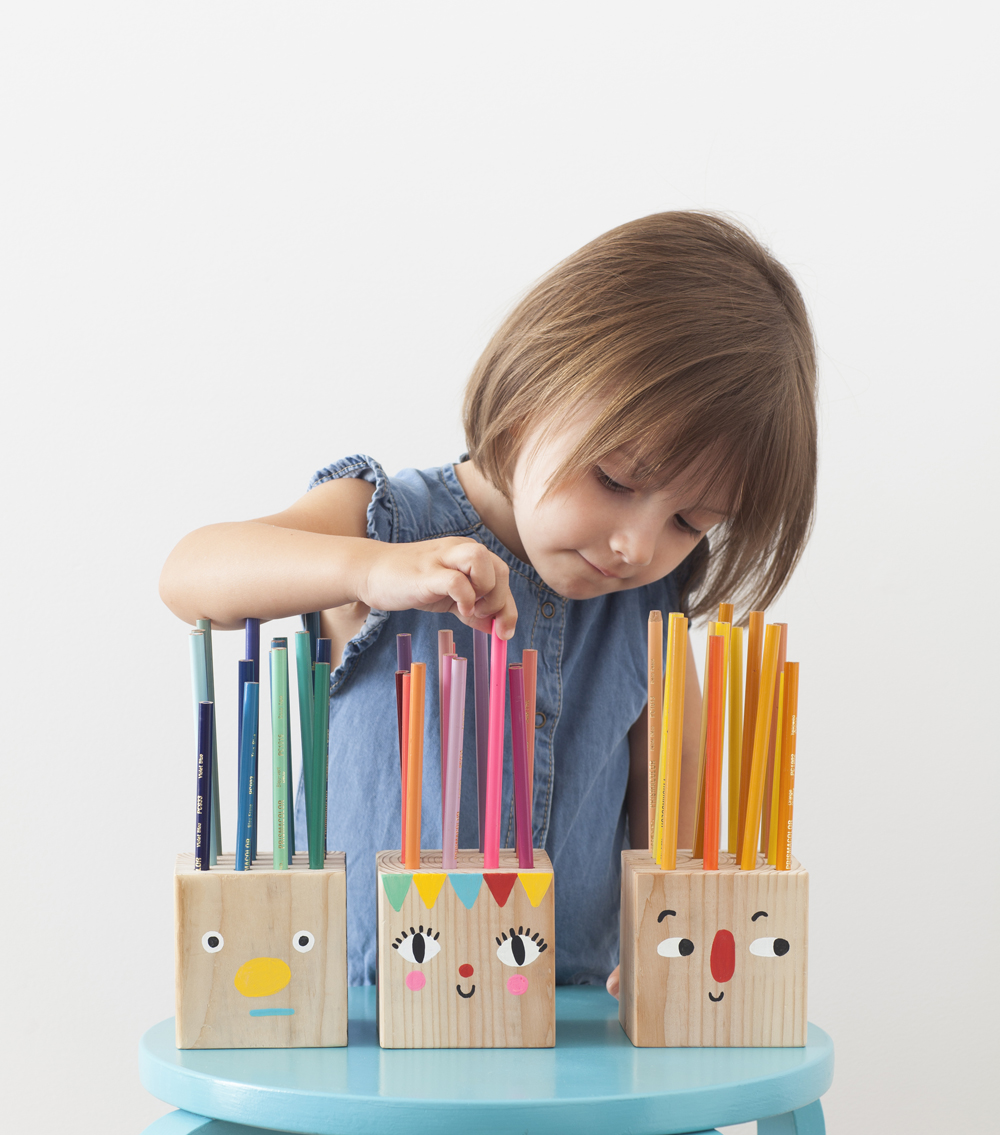 DIY wood block pencil holders with mini faces (via mermagblog.com)