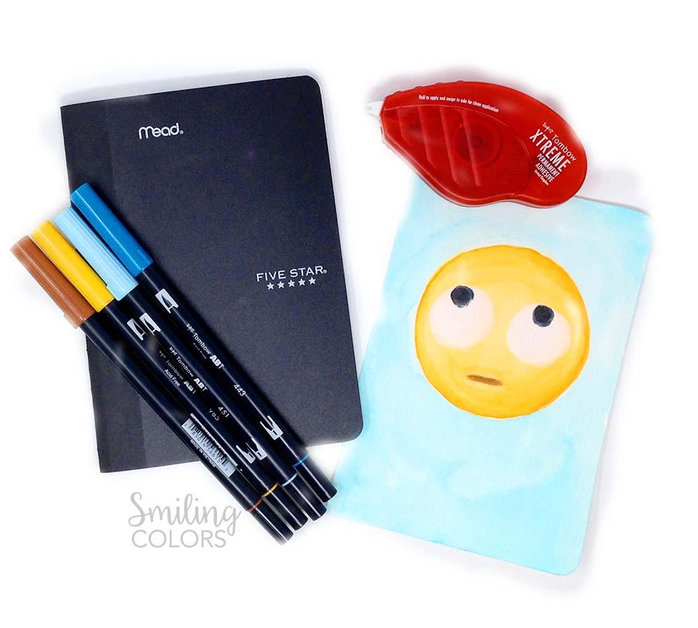 DIY watercolor painted emoji notebooks