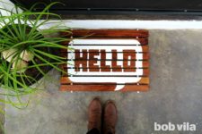 DIY lumber doormat with HELLO print