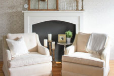 DIY elegant faux mantel in white with a black screen