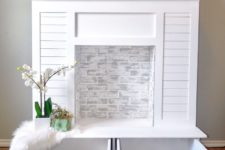 DIY faux fireplace with a large storage drawer