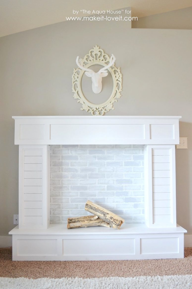 DIY fake wood and brick fireplace (via makeit-loveit.com)
