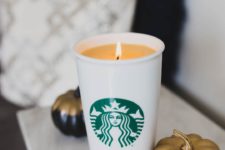 DIY pumpkin spice latte candle in a coffee cup