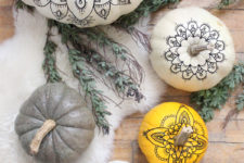 DIY boho Halloween pumpkins with henna decor