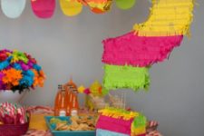 DIY colorful fringe question mark pinata filled with candies