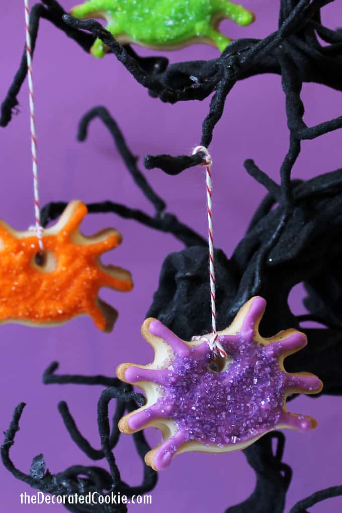 DIY colorful spider cookie ornaments for Halloween (via thedecoratedcookie.com)