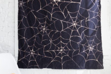 DIY spiderweb tablecloth or backdrop with bleaching