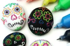 DIY sugar skull rocks with puffy paints