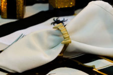DIY gilded vampire fangs napkin rings for Halloween