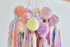 03 make your tree bright and bold with colorful pompom and tassel ornaments, all made for cheap