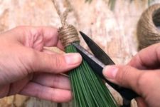 04 make tassels of real pine needles and twine, this is a such a cool natural idea that will easily bring a natural feel to your home