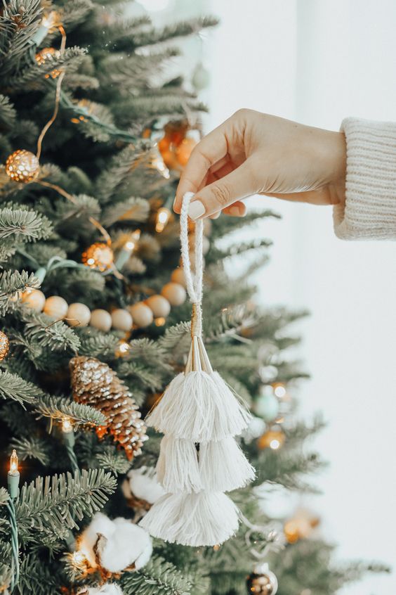 white tassels will add a boho chic touch to your amazing Christmas tree, vary the sizes and looks
