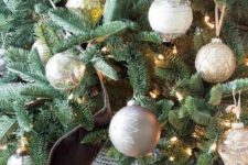 10 a bashed metal Christmas tree skirt is a great touch to a rustic or metallic Christmas tree