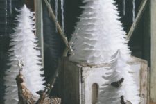 12 a trio of white feather Christmas trees is a cool idea for your mantel or windowsills