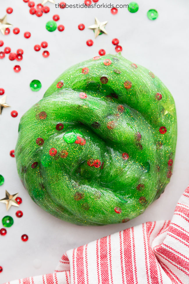 DIY Christmas tree slime with sequins (via www.thebestideasforkids.com)