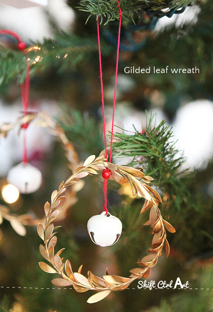DIY gold greenery wreath ornament with a jingle bell