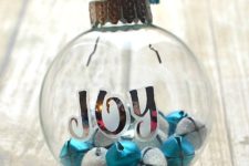 DIY clear Christmas ornament filled with jingle bells