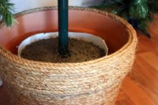 DIY Christmas tree stand of two planters, soil and jute