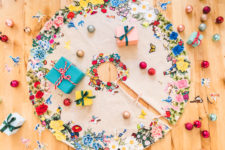 DIY Christmas tree skirt with multiple colorful appliques