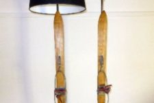 04 a lamp upcycled with vintage skis to create a fun and whimsy winter decoration