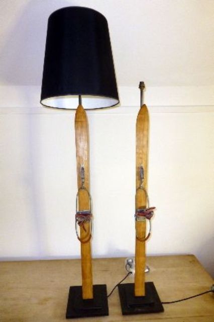 a lamp upcycled with vintage skis to create a fun and whimsy winter decoration