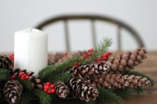 06 a tray with pinecones, berries, evergreens and a candle is a simple and natural centerpiece