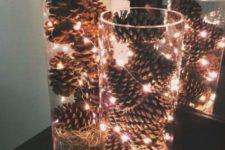 15 tall glass vases filled with pinecones and LEDs will bring a rustic yet modern touch to your space