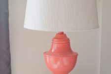 16 spruce up a usual lamp with coral paint and add a textural shade to give it a new life and a trendy look