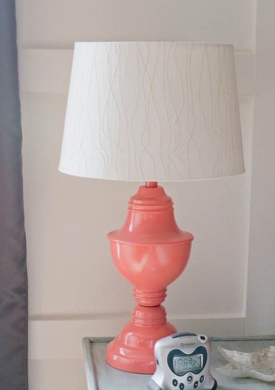 spruce up a usual lamp with coral paint and add a textural shade to give it a new life and a trendy look