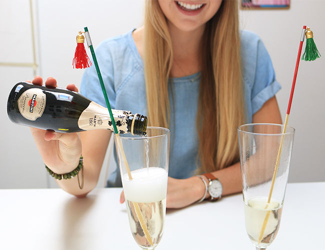 DIY colorful tassel drink stirrers for holiday parties