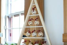 DIY A-framed Christmas tree with ornaments hanging