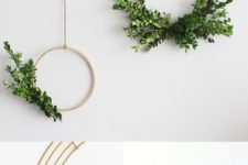 DIY minimalist Christmas wreaths with evergreens and berries