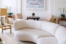 02 a creamy curved sofa like this one is a bold statement for a modern stylish living room