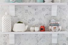 07 grey marble hex tiles with white grout look timeless and bring a refiend touch to the kitchen