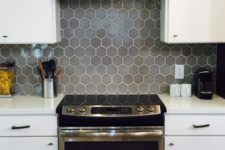 09 a grey hex tile kitchen backsplash with white grout adds color to the space and make it catchier