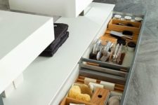 14 a vanity with several drawers incorporated allows storing a lot