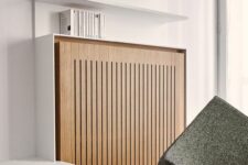 a stylish radiator cover of light-stained timber will let you seamlessly integrate your radiator into the space