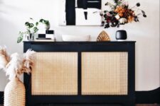 a stylish radiator cover with black framing and cane screens is perfect for a modern entryway or living room
