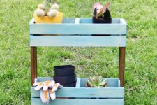 DIY tiered garden shelf of crates
