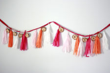 DIY burnt wood slices and colorful tassels banner